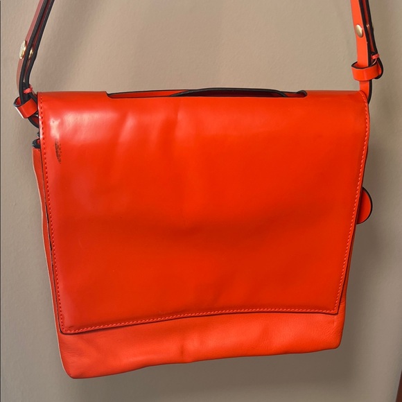 kate spade Handbags - Kate Spade Saturday Bright Orange Leather Circle Tag Messenger Bag Purse Handbag